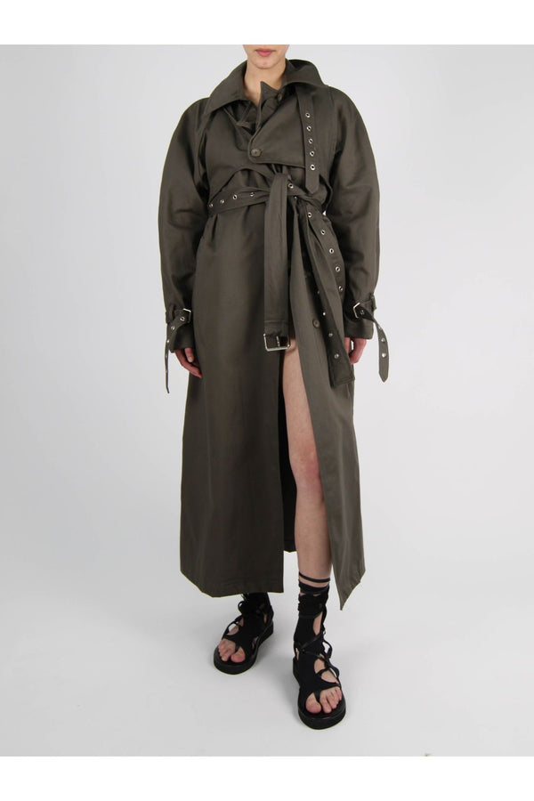 Model wearing the Otto wrap trench coat in tobacco color from the brand OTTOLINGER