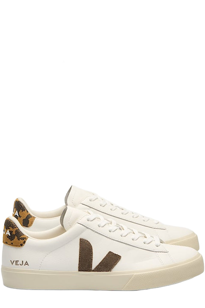 A pair of Veja sneakers in white and brown with darker brown pattern accents, shown against a plain white background.