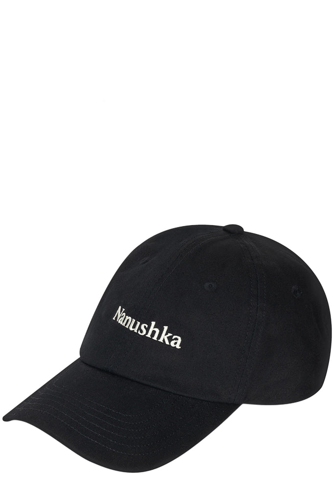 A black baseball cap with the word 'Namushka' embroidered in white script on the front, shown against a plain white background.