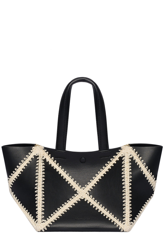 A black faux leather tote bag with a geometric diamond pattern of cream-colored whipstitching on the front, featuring two black shoulder straps, photographed against a plain white background.