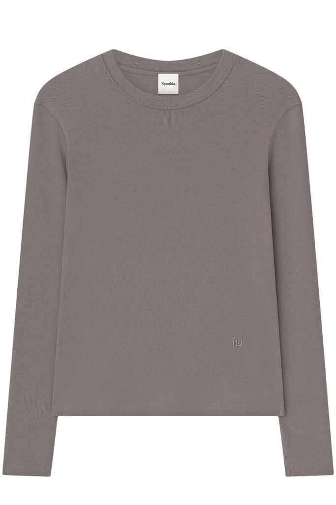 A long-sleeve crewneck top in a muted taupe-gray color, shown flat against a plain white background. A small white brand label is visible at the inner collar, and a subtle tonal embroidered logo is on the lower right side.