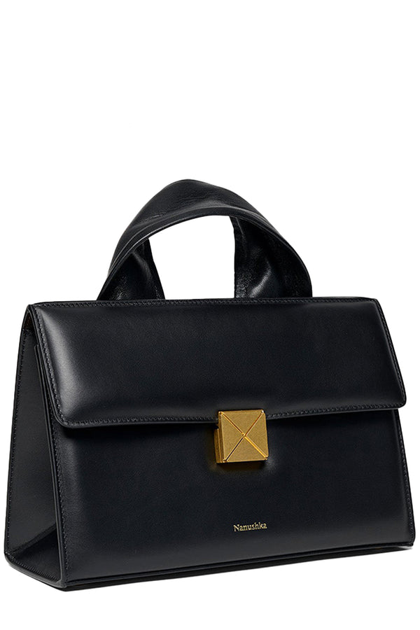 Rotated view of Nanushka leather handbag in black with golden clasp, shown against a plain white background.