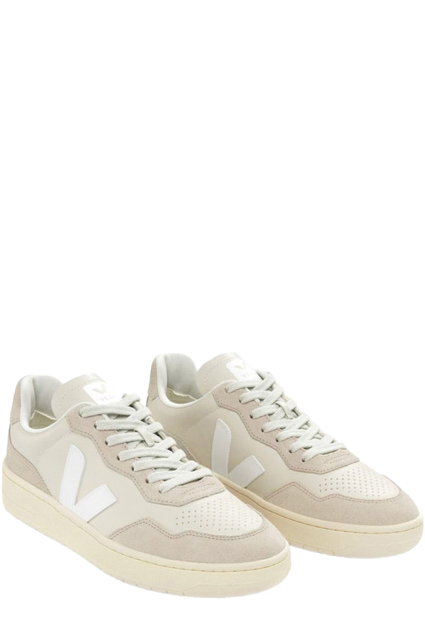 The V-90 organic-traced leather sneakers in pierre and white colors from the brand VEJA