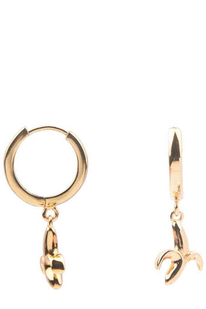 The banana earrings in gold colour from the brand ALL THE LUCK IN THE WORLD