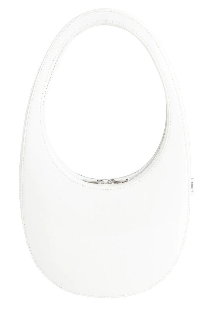 The Patent Swipe bag in the colour white by the brand COPERNI