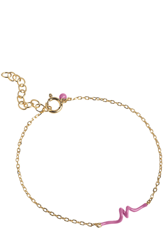 The twist bracelet in gold and pink colour from the brand ENAMEL COPENHAGEN