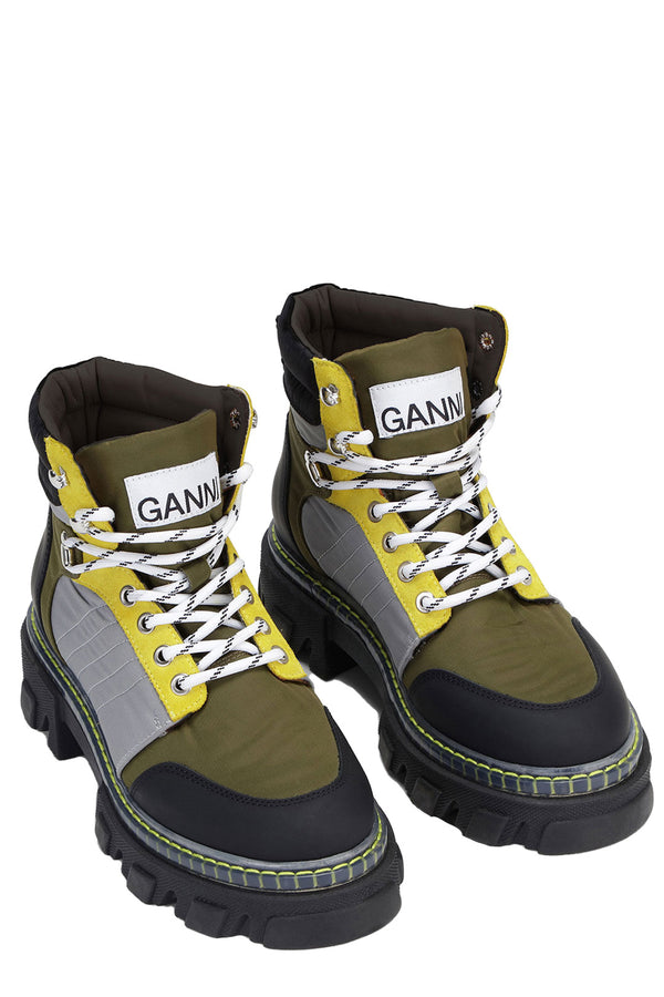 The cleated-sole lace-up boots in kalamata color from the brand GANNI.