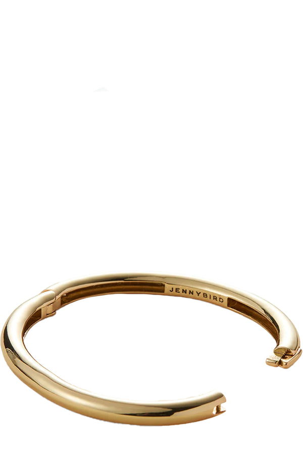 The Gia bangle bracelet in gold colour from the brand JENNY BIRD
