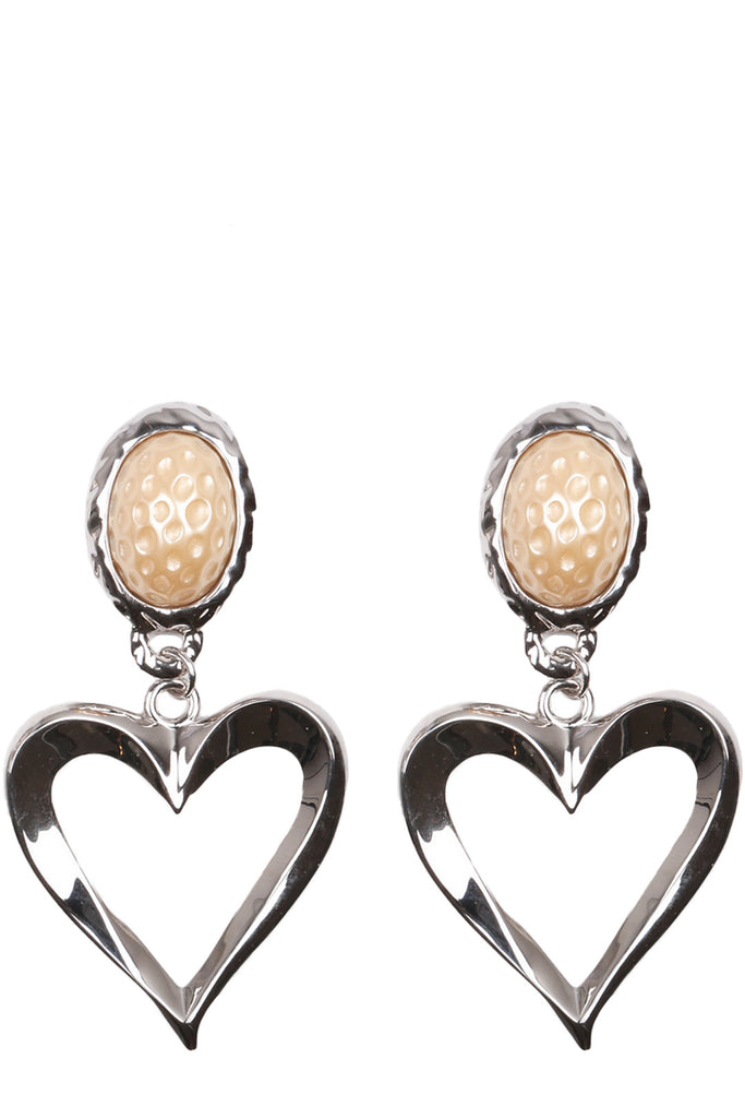 The Sally Ride earrings in silver and pearl colours from the brand JULIETTA