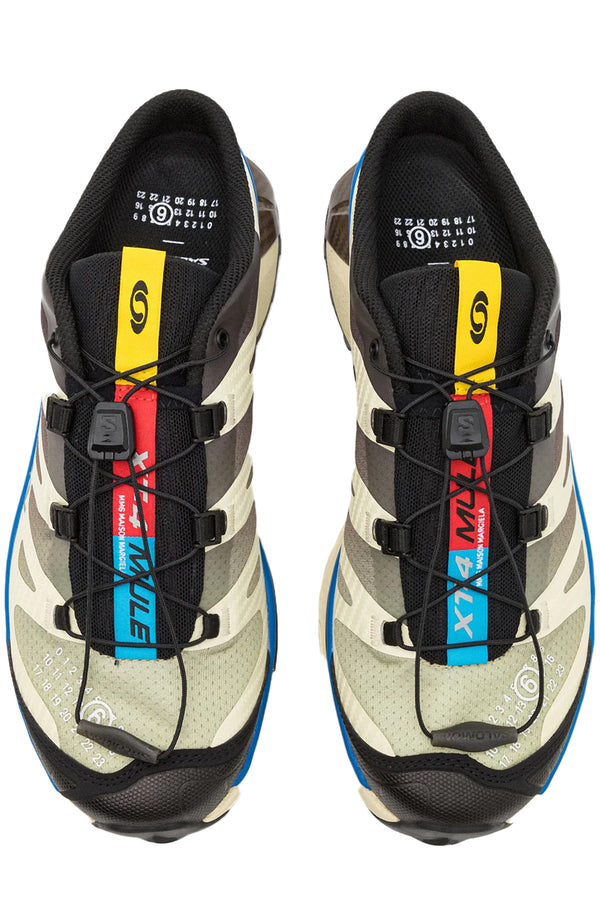 The MM6 X Salomon XT-4 Mules in transparent yellow, shale and lapis blue colour from the brand MM6 X Salomon