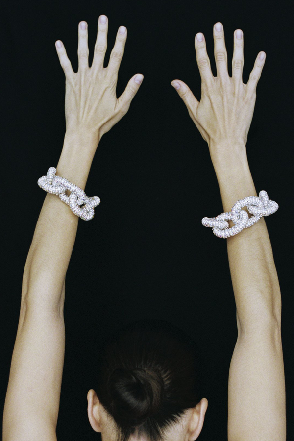 Model wearing the Diamond Tire bracelet in silver and clear colours from the brand PEARL OCTOPUSS.Y