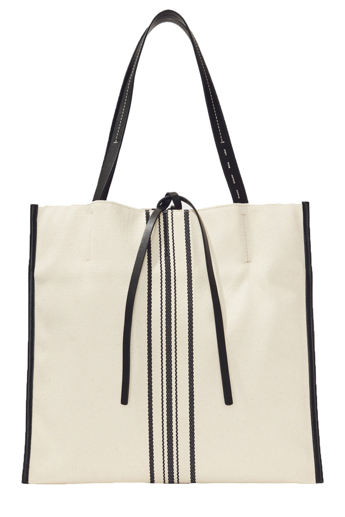 The Twin striped Canvas tote bag in natural and black colors from the brand PROENZA SCHOULER