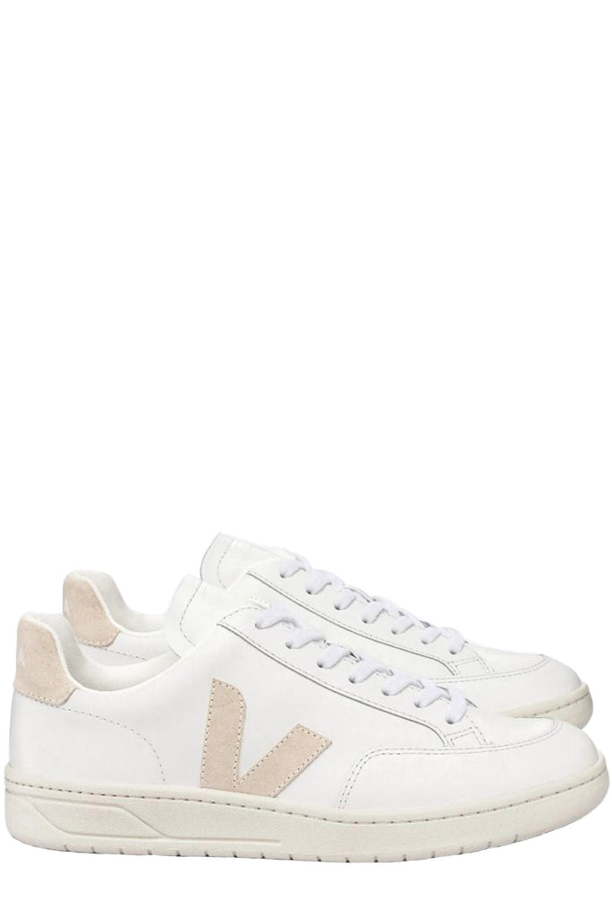 The V-12 leather sneakers in extra white and sable colors from the brand VEJA