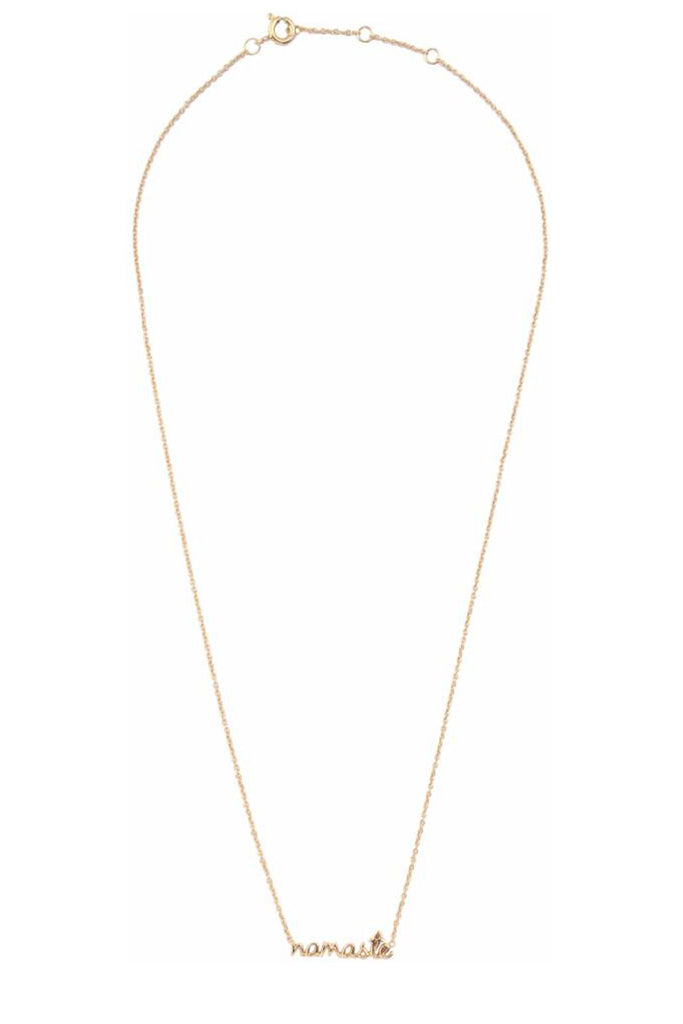The Namaste necklace in gold color from the brand All the Luck in the World