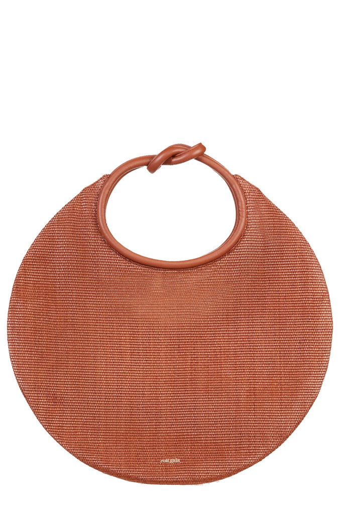 The Adina circular raffia bag in dark brown color from the brand CULT GAIA